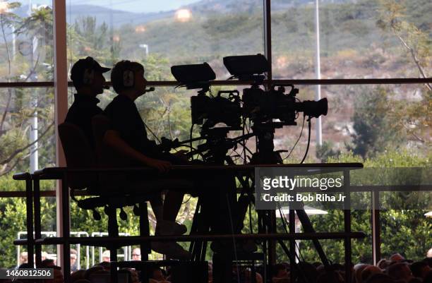 Video crews film Pastor Rick Warren at Saddleback Community Church and has 20,000 people cycling through 7 weekend worship services.