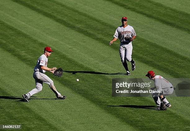 Bloop signle hit by Gordon Beckham of the Chicago White Sox drops between Brian Bixler, Justin Maxwell and Jed Lowrie of the Houston Astros at U.S....