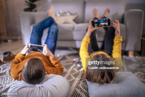 Playing Using Phone 32,743 Kids Playing On Phone Stock Photos, High-Res Pictures, and ...