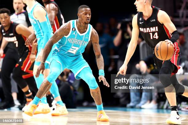 Terry Rozier of the Charlotte Hornets defends Tyler Herro of the Miami Heat during the second quarter of a basketball game at Spectrum Center on...