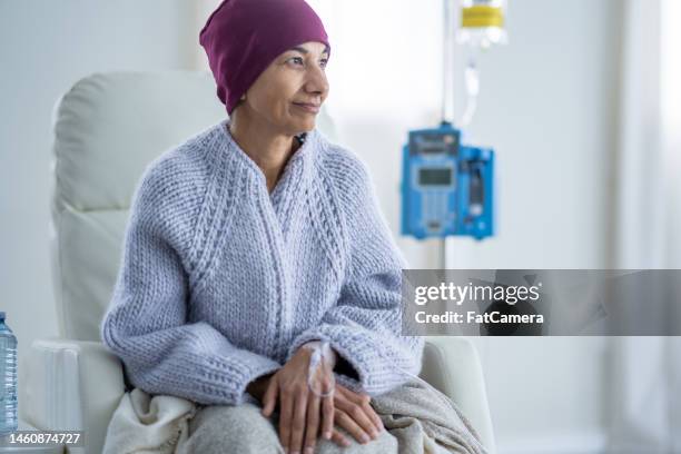 senior woman undergoing chemotherapy - chemotherapy stock pictures, royalty-free photos & images