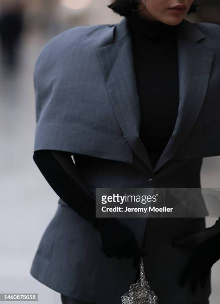 Farah Assaad seen wearing Ezzat official grey suit during Paris Fashion Week on January 26, 2023 in Paris, France.