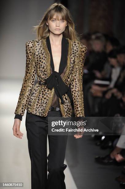 Model on the runway at Balmain's fall 2010 show. Designed by Christophe Decarnin.