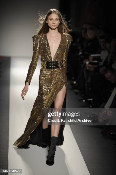 Model on the runway at Balmain's fall 2010 show. Designed by Christophe Decarnin.