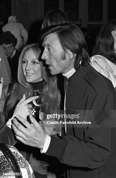 Actor Laurence Harvey with wife Paulene Stone at a party thrown by Hugh Hefner at The Playboy Mansion