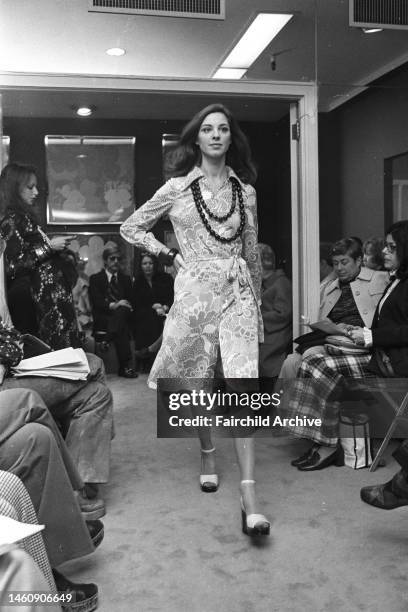 Runway show of Diane von Furstenberg's Spring 1973 RTW collection. Article title: 'The Globetrotters
