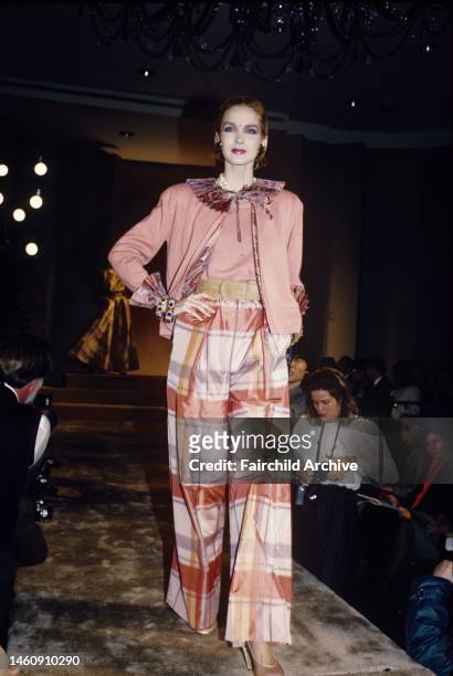 Peach jacket with pleated trim worn with wide-leg plaid pants in the Bill Blass Spring 1986 RTW show