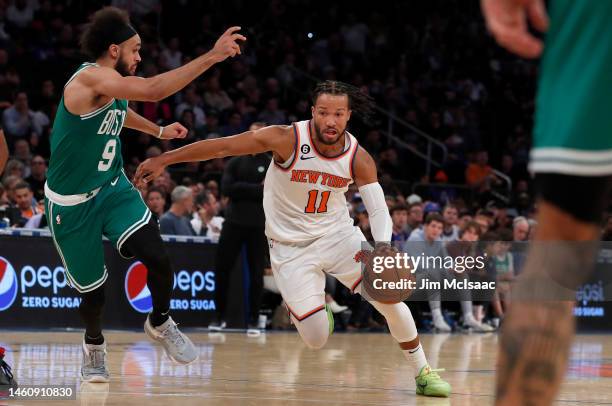 Jalen Brunson of the New York Knicks in action against Derrick White of the Boston Celtics at Madison Square Garden on November 05, 2022 in New York...