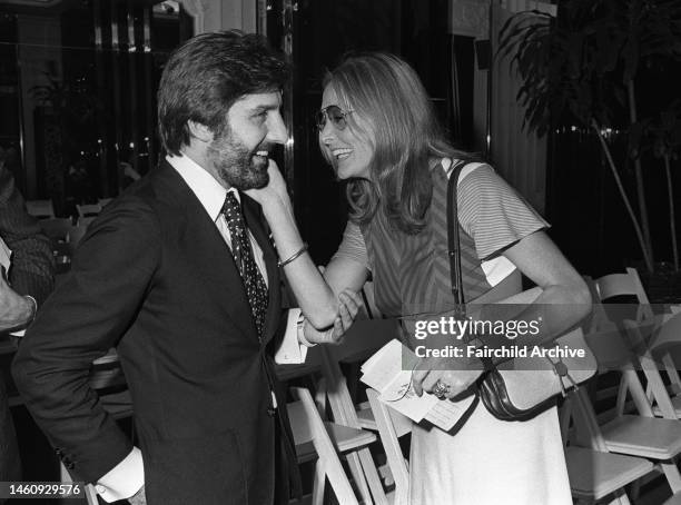 Designer Emanuel Ungaro with Elga Andersen at a Saks Fifth Avenue presentation of Ungaro's Fall 1974 show to benefit the Women's Hospital at St....