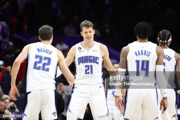 Moritz Wagner of the Orlando Magic celebrates with teammates during the fourth quarter against the Philadelphia 76ers at Wells Fargo Center on...