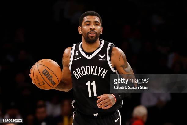 Kyrie Irving of the Brooklyn Nets dribbles during the second half against the Los Angeles Lakers at Barclays Center on January 30, 2023 in the...