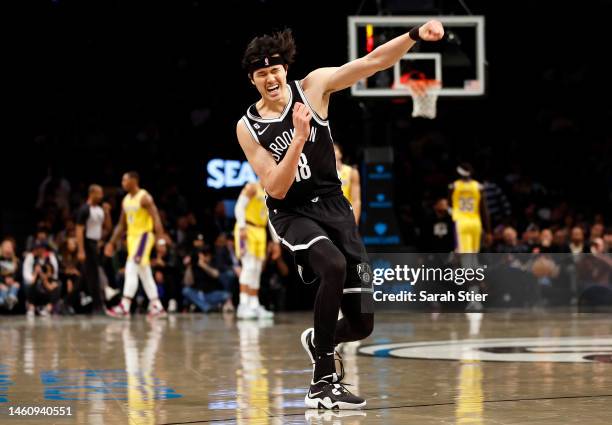 Yuta Watanabe of the Brooklyn Nets reacts after scoring during the first half against the Los Angeles Lakers at Barclays Center on January 30, 2023...