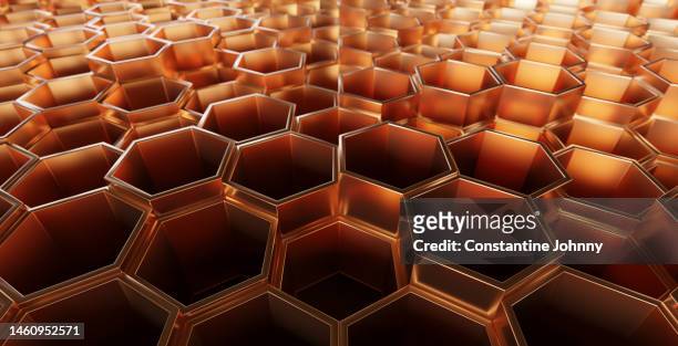 shiny golden array of hexagonal cubes. abstract geometric background. - comb stock pictures, royalty-free photos & images
