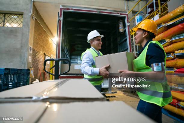 Loading Truck With 4 People 1,324 Woman Loading Truck Stock Photos, High-Res Pictures, and Images ...