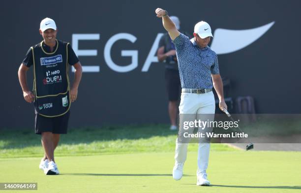 Rory McIlroy of Northern Ireland celebrates victory on the 18th green during the final round of the Hero Dubai Desert Classic at Emirates Golf Club...