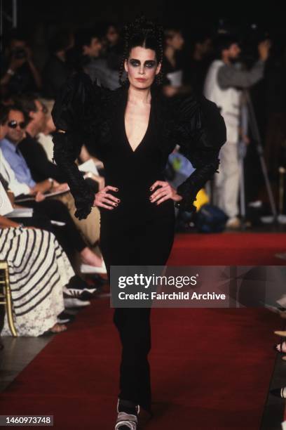 Model on the runway of the Jean Paul Gaultier fall 1997 couture collection in the medieval Conciergerie on the Ile de la Cite on July 9, 1997 in...