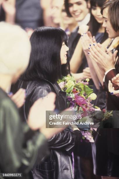 Fashion designer Anna Sui with models during the finale of her Fall 1995 Ready-To-Wear runway show.