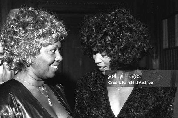 Whitney and Cissy Houston attending Clive Davis's legendary pre-grammy party at the Helmsley Palace on March 2, 1988 in New York..Article title:...