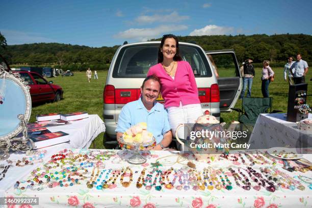 Charles Ingram and his wife Diana sell copies of his book and other merchandise at a car boot sale, on August 27, 2022 in Bristol, England. Charles...