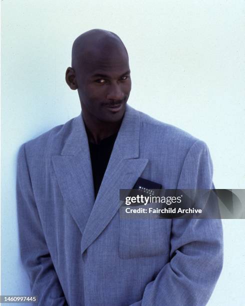 Portrait of Chicago Bulls basketball player Michael Jordan in New York, circa 1996. Article title: 'Air Time