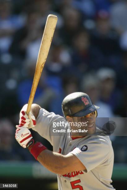 Leftfielder Albert Pujols of the St. Louis Cardinals prepares to take a swing against the Colorado Rockies on September 19, 2002 at Coors Field in...