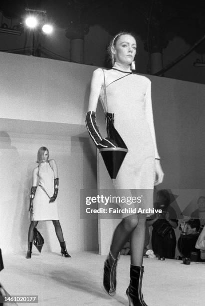 Dress accented with plastic pouch in French designer Jean Paul Gautier's Spring 1980 collection