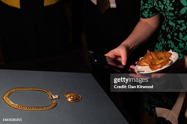 Gold pendant is displayed during a photocall at The British Museum on January 31, 2023 in London, England. The British Museum launches its 2021...