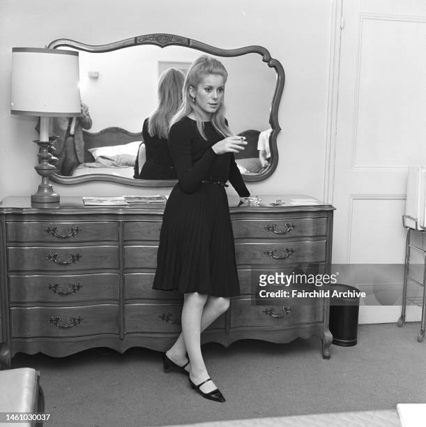 French actress Catherine Deneuve being interviewed in a hotel room in Paris