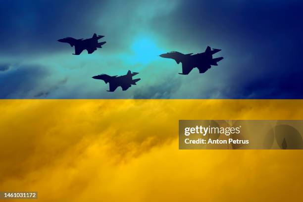 fighters at sunset on the background of the flag of ukraine - air defense stock pictures, royalty-free photos & images