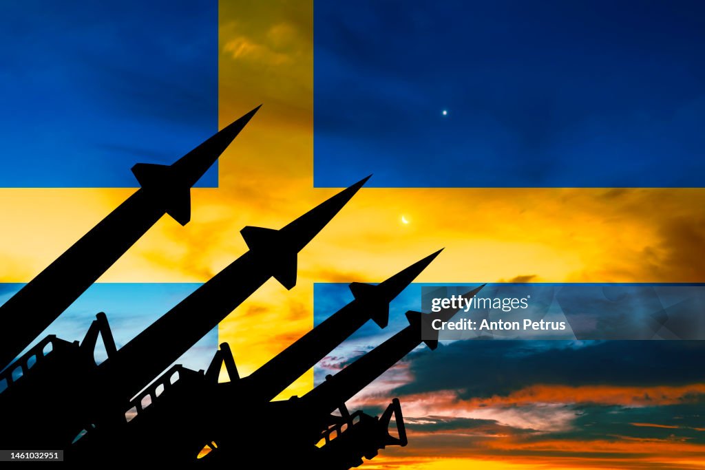 Missile system on the background of the flag of Sweden