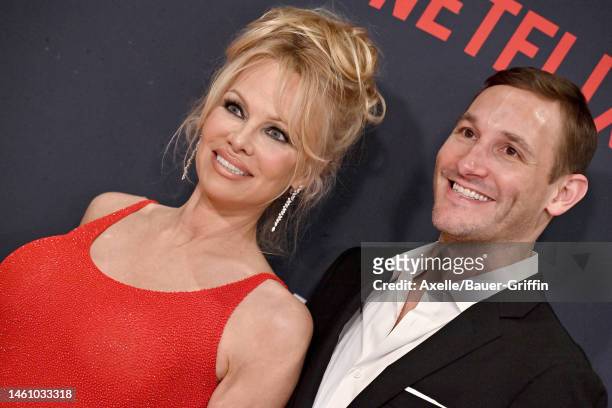 Pamela Anderson and Ryan White attend the Premiere of Netflix's "Pamela, a love story" at TUDUM Theater on January 30, 2023 in Hollywood, California.