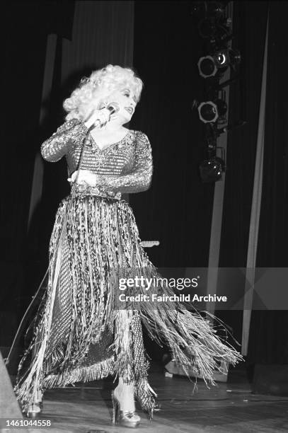 Country musician and vocalist Dolly Parton performing at the New York Hospital-Cornell Medical center benefit held at the Waldorf-Astoria on March 3,...
