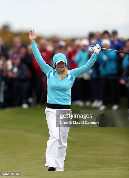 Stephanie Meadow of Northern Ireland and the Great Britain and Ireland team celebrates securing the clinching point as the Great Britain and Ireland...