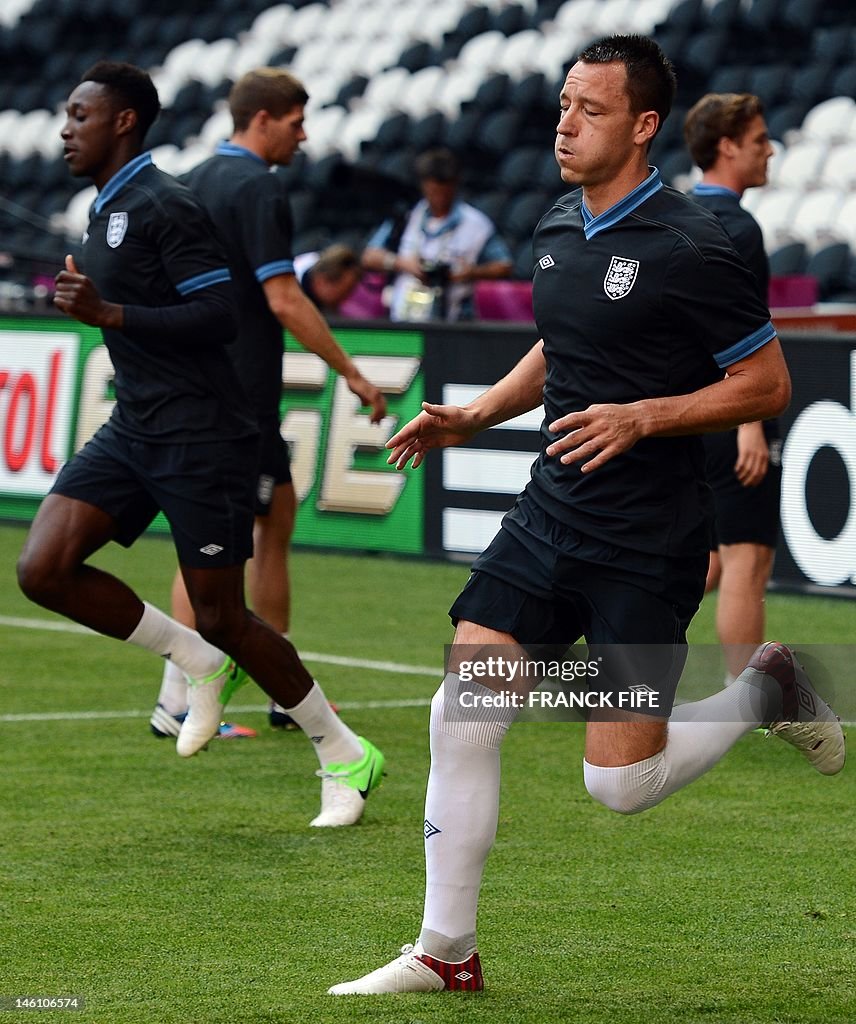 England's defender John Terry takes part