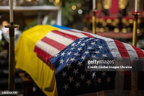 The coffin covered with the flags of the USA and Ukraine during the farewell ceremony in the Latin Cathedral on January 31, 2023 in Lviv, Ukraine....