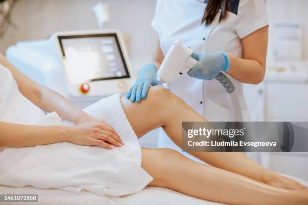 hair removal procedure - wax figure stock pictures, royalty-free photos & images