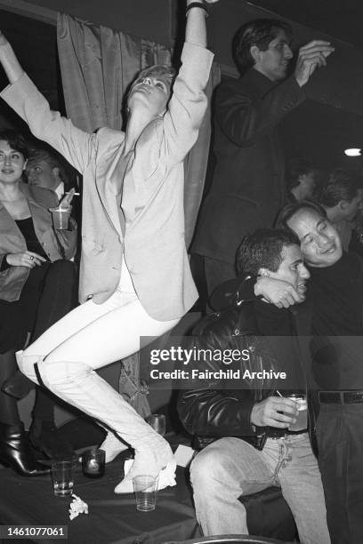 Guests dancing on the table attending Elle Macpherson's Metro C&C dinner party in celebration of 'the end of summer and the beginning of winter' on...