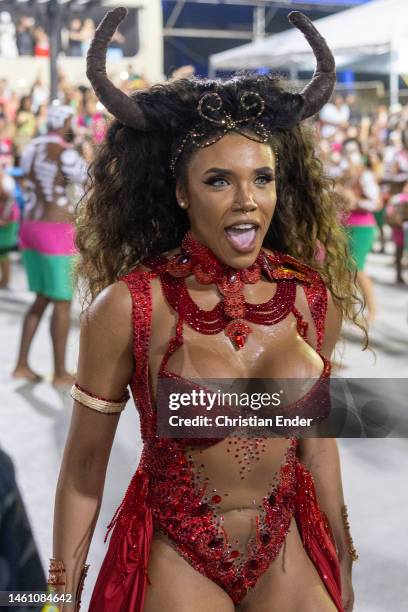 Evelyn Bastos, Drums Queen of Estação Primeira de Mangueira, performs while samba dancers rehearse at the Marques de Sapucai sambodromo ahead of the...