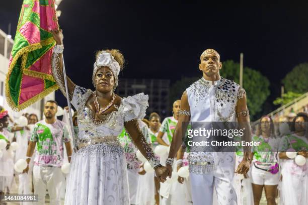 Cyntia Santos and Matheus Silvério, first Master of Cerimonies and Flag Bearer couple of Mangueira perform while samba dancers rehearse at the...