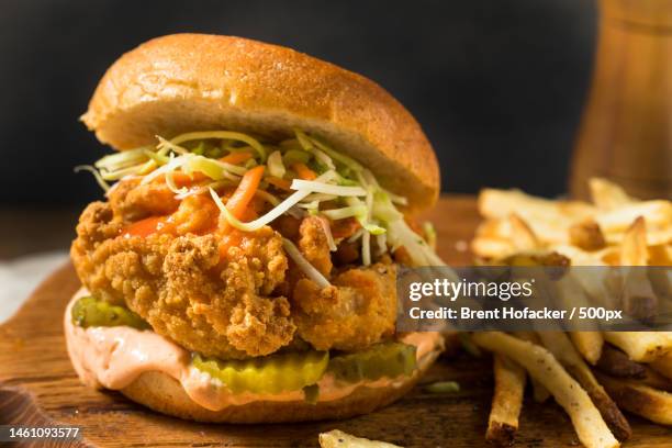 close-up of burger on table,united states,usa - coleslaw stock pictures, royalty-free photos & images