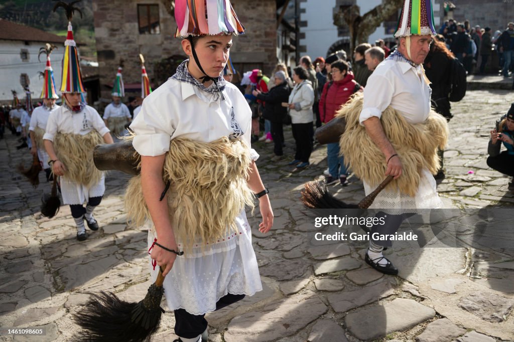 Basque Tribe People dressed up as Bellringer carrying sheep furs and big cowbells ...