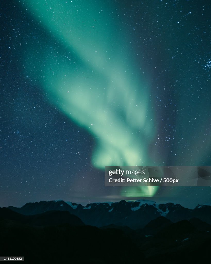 Scenic view of mountains against sky at night,Balsfjord Municipality,Norway