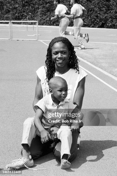 Olympian Valerie Brisco-Hooks with 3-year-old son Al Hooks Jr. During workout session at UCLA Drake Stadium, May 20, 1985 in Los Angeles, California.