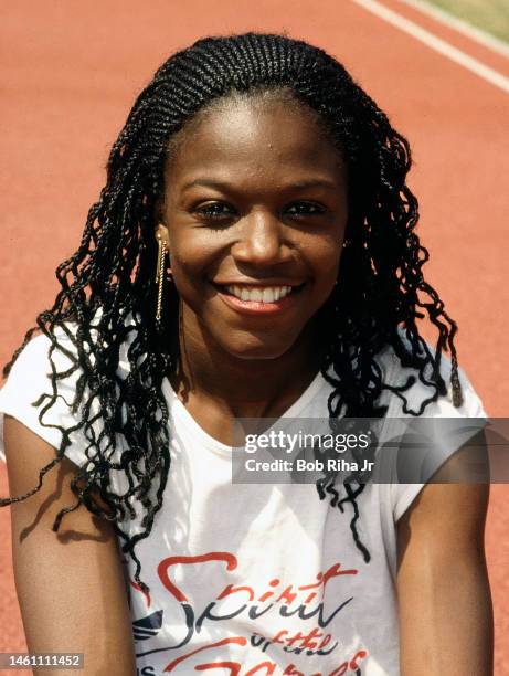 Olympian Valerie Brisco-Hooks with 3-year-old son Al Hooks Jr. During workout session at UCLA Drake Stadium, May 20, 1985 in Los Angeles, California.