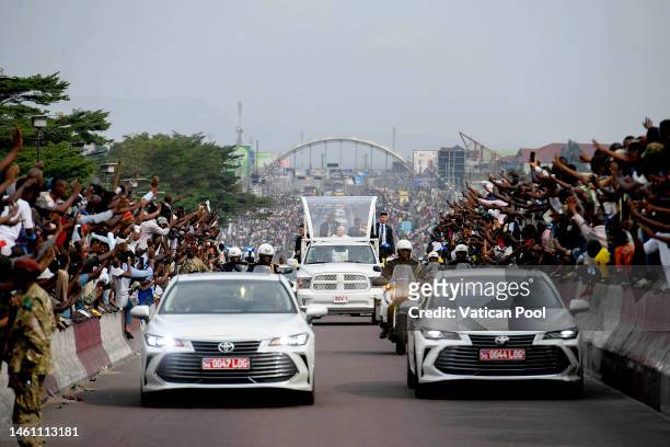 Pope Francis leaves the “Ndjili” International Airport in the popemobile to the Garden of the Palais de la Nation for a meeting with the authorities,...