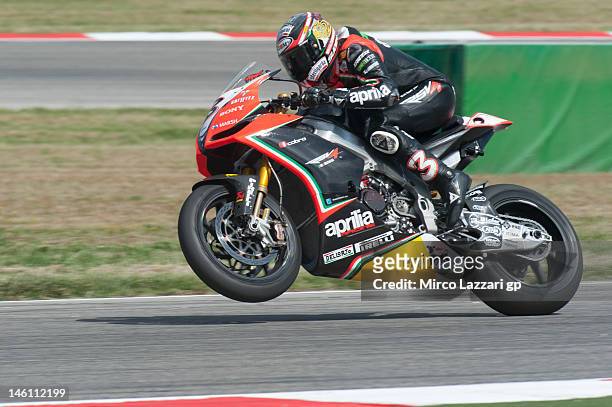 Max Biaggi of Italy and Aprilia Racing Team lifts the front wheel during the Race 2 of the round 7' of the 2012 Superbike FIM World Championship at...