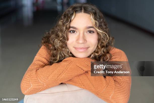portrait of teenage girl - 14 year old biracial girl curly hair stock pictures, royalty-free photos & images