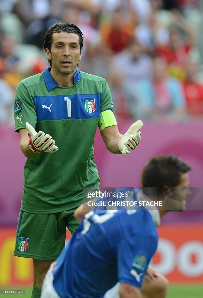 Italian goalkeeper Gianluigi Buffon reac