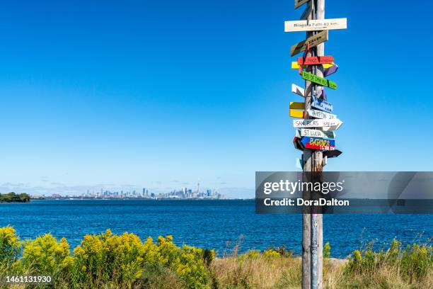 road signs and direction at colonel samuel smith park, etobicoke, canada - etobicoke ontario stock pictures, royalty-free photos & images