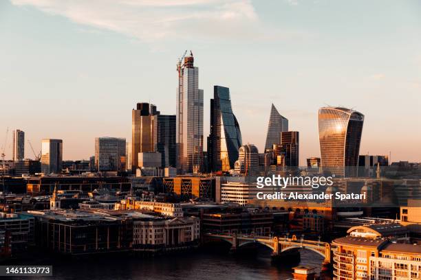 city of london skyline and thames river at sunset, aerial view, uk - london cityscape stock pictures, royalty-free photos & images